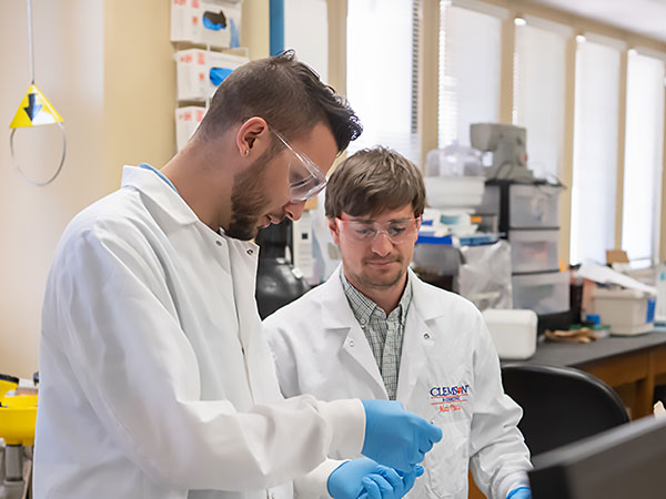 Two students in lab