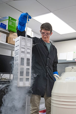 Student lifting up equipment with cold vapor