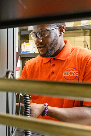 Student in bioe lab using equipment