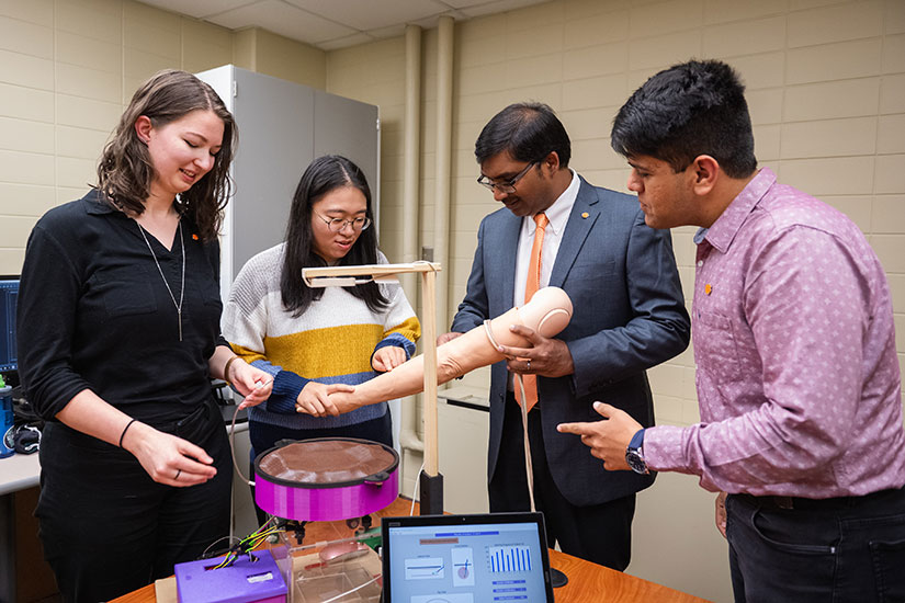 Singapogu in lab with students