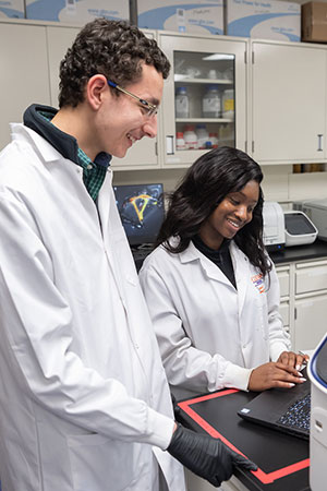 Two students in lab