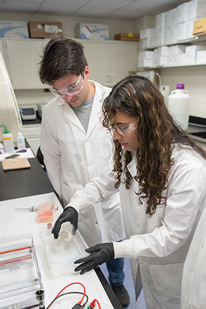 Two students in lab