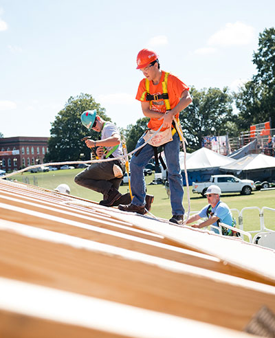 Students helping build Habitat For Humanity house on Bowman field.