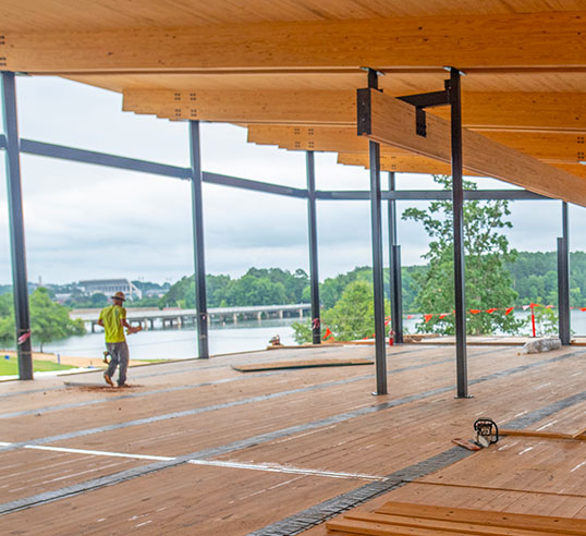 VIew of inside Quattlebaum construction, overlooking water towards campus.