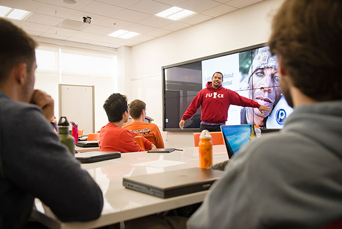 Civil student giving presentation in class.