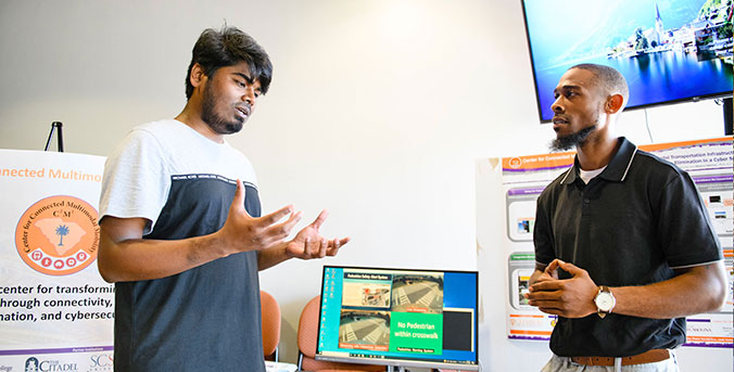 Grad students in C2M2 office