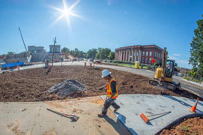 View of new sidewalk and grading at 93 redlight.