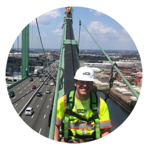 Sam Dodd on bridge with hard hat