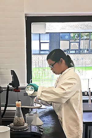 Female student in lab in Denmark Unit Ops lab.