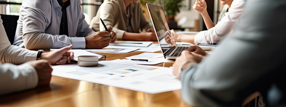 Professionals sitting around a conference table