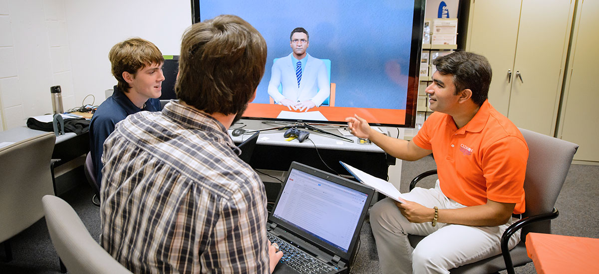 Students in lab with professor and VR components