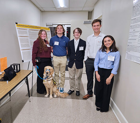 Students gathered in Riggs Hall after presenting their project.