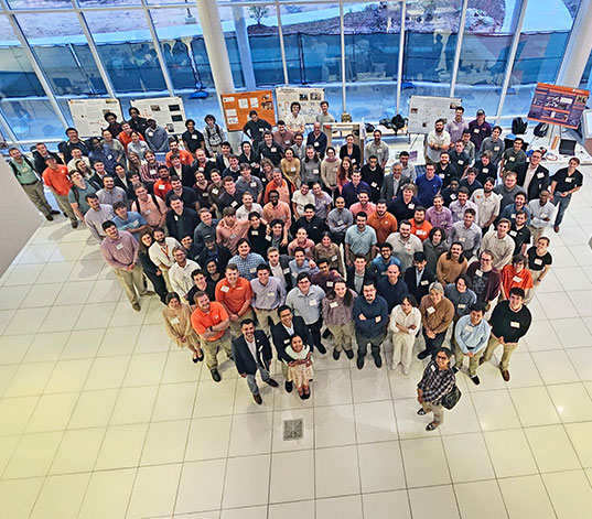 Students and faculty in large group in Watt Center