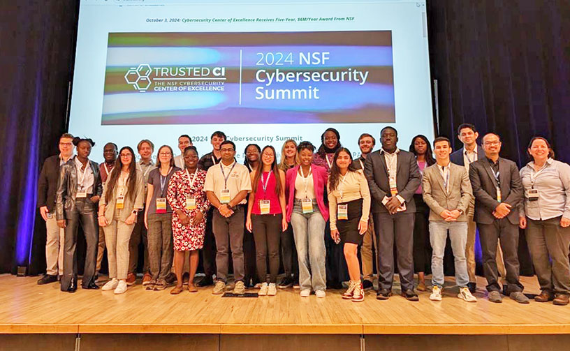 Group on stage at Cybersecurity competition.