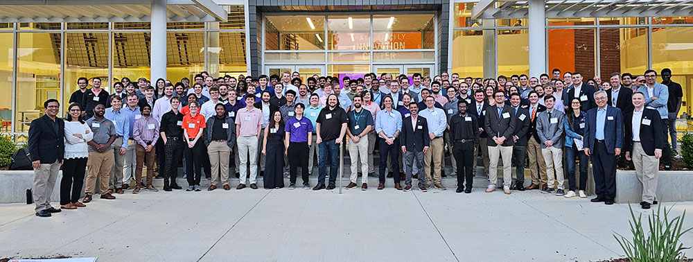 Group of ECE senior design students in front of Watt