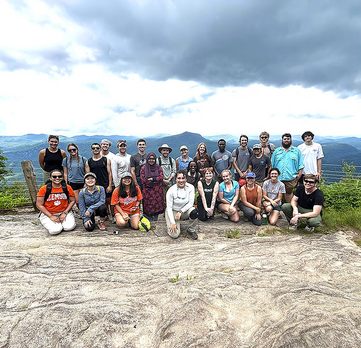 Field Camp students on rock outcrop at Whiteside Mountain