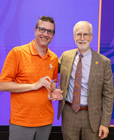 Professor with award.