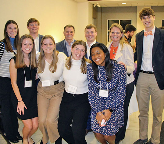 Group posing at event