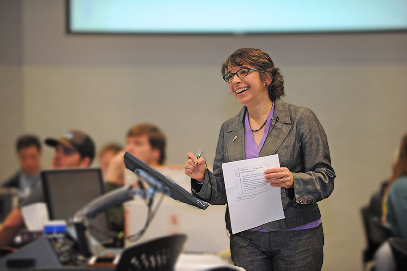 Benson in classroom with students