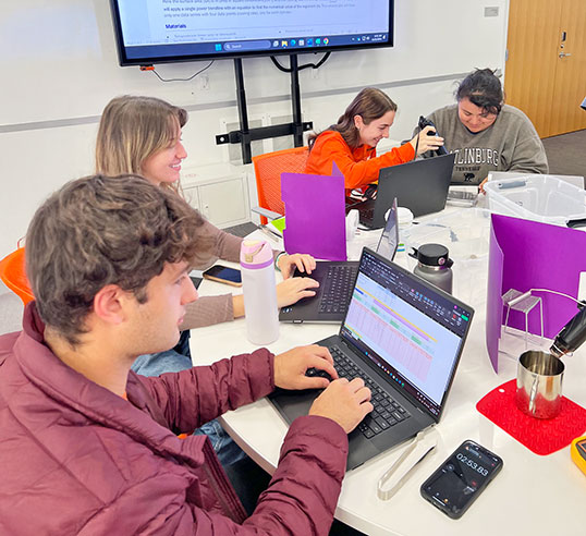 Students in class working on assignment