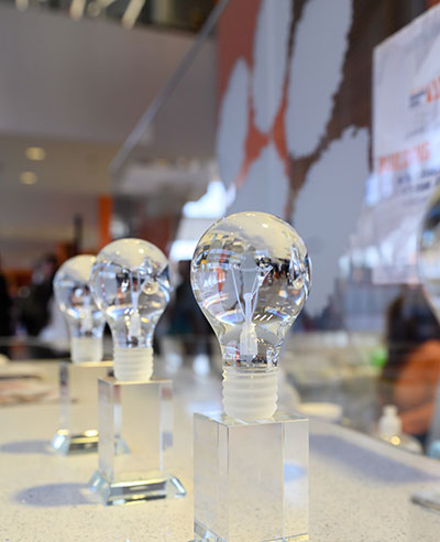 Glass awards on table at annual awards event.