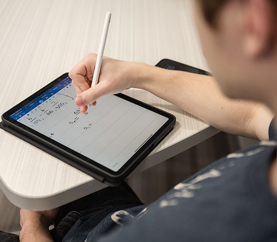 Close up of tablet being used in math class