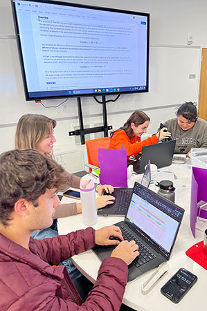 Group of students working on assignment
