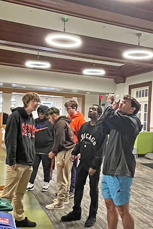 Students in Holtzendorff working on class project as a group 