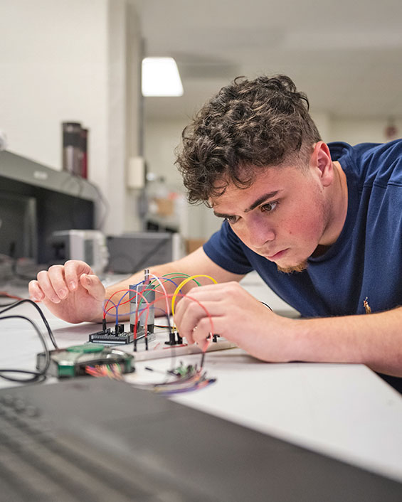 Student working on electrical components