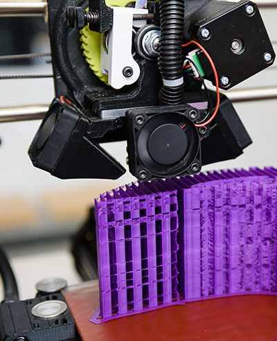 Close-up of 3d printing machine working.