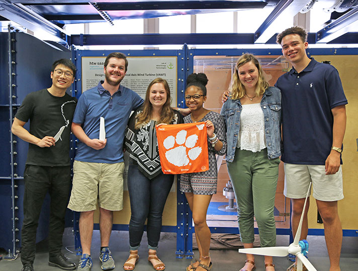 Study Abroad group with orange tiger rag flag. 