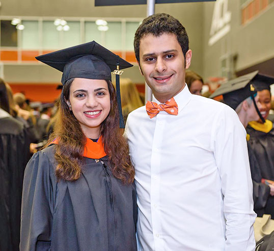 Female student in graduation cap and gown.