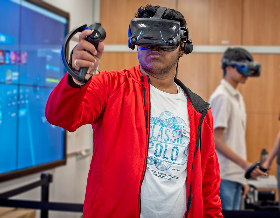 student using VR headset in Watts.