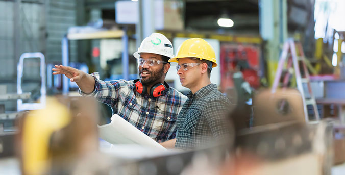 Employees on site of building project.