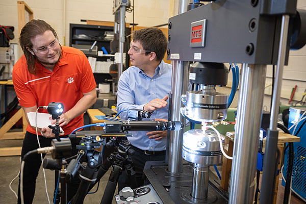 Pataky using lab equipment in FRAME laboratory