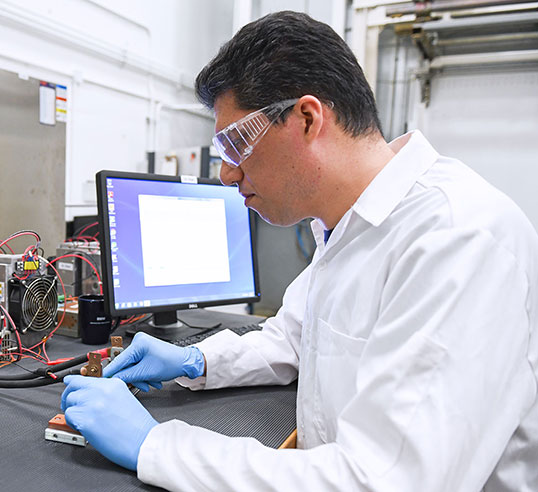 Man in composite research lab