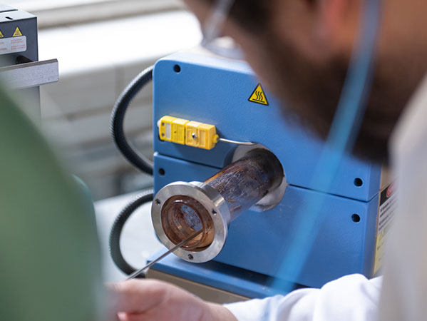 Student in Olin Hall lab utilizing equipment.