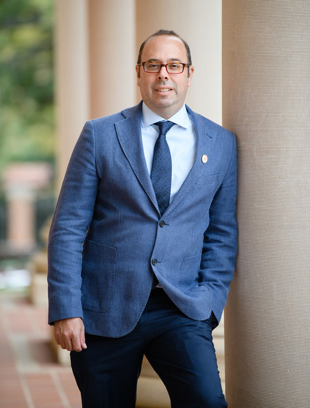 Dr. Brinkman outside of Sikes Hall on campus.
