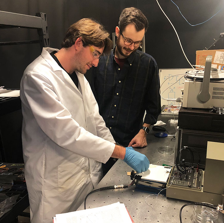 Two students in Foulger lab