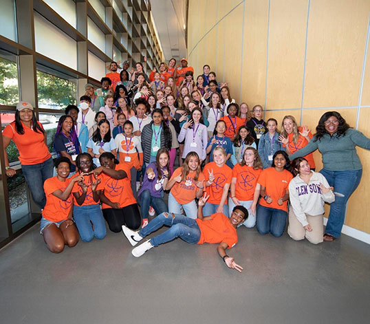 Scout participants taking a group photo in Freeman Hall
