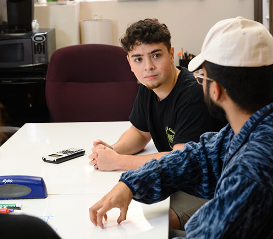 Two students talking one-on-one