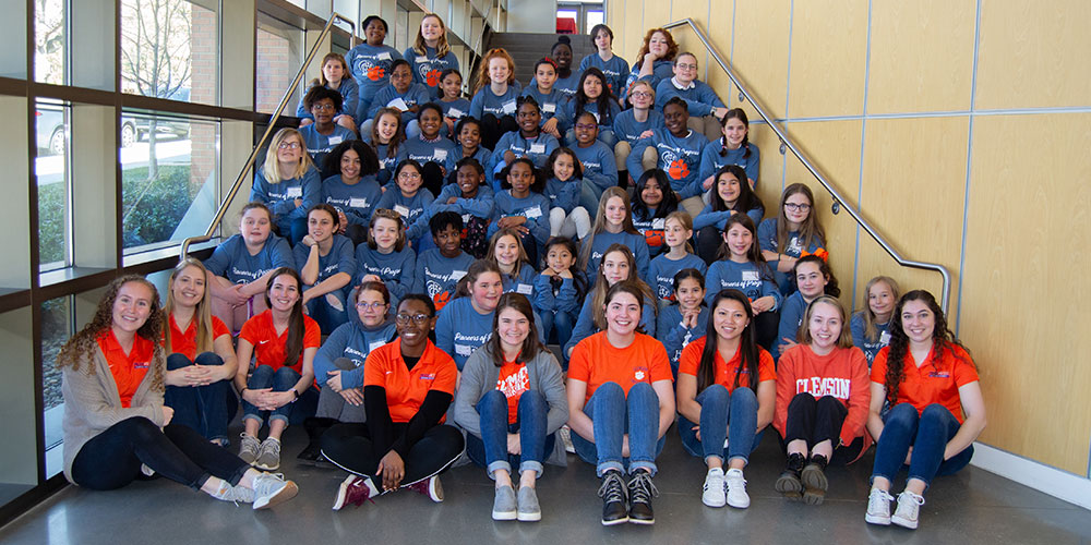 Group of young students in Freeman Hall.