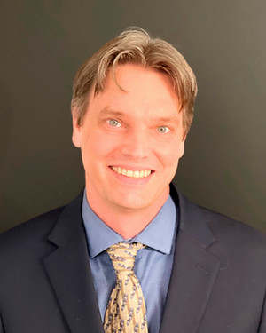 Dr. Dustin Froula headshot