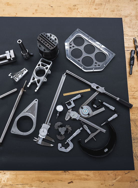 A collection of machining tools on work table