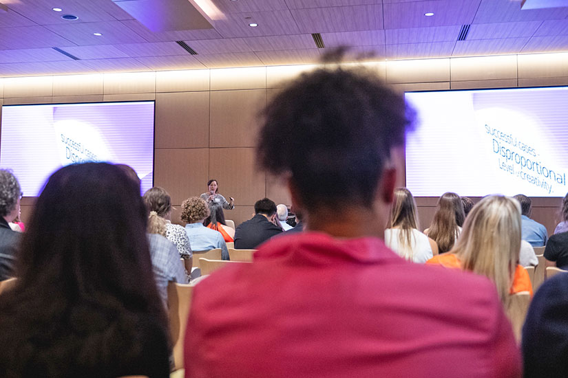 Students in auditorium at event