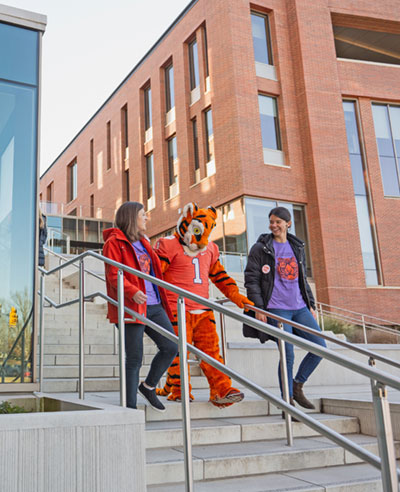 Clemson tiger mascot on campus with students