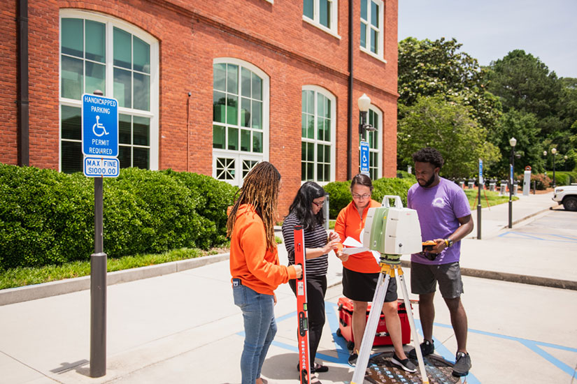 Civil students and faculty surveying