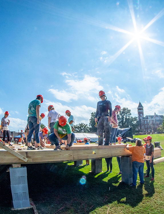 Students building float on Bowman Field