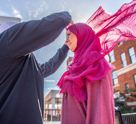 A female student wrapping scarf hijab