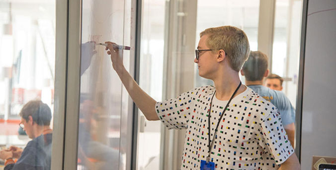 Student in Watt Center room.